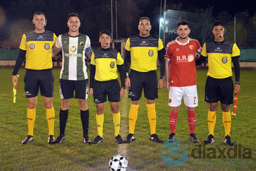 Los árbitros y los capitanes